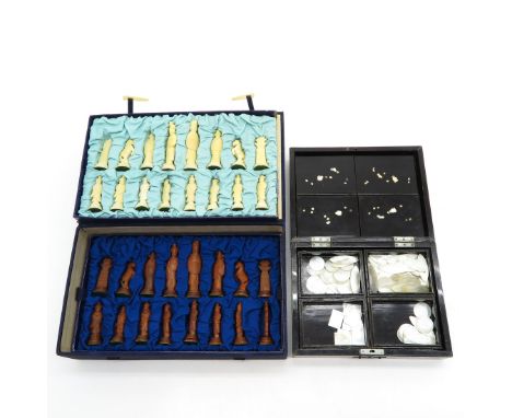 Including carved figures and mother of pearl playing pieces, largest figure is 9 cm. tall. This lot may not be shipped outsid