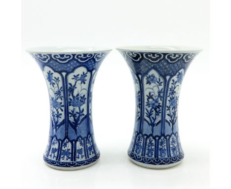 Blue and white floral decor, marked on bottom with double ring and censer, 27 cm. tall.