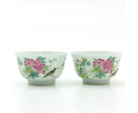 Floral decor with bird and signed Chinese text, marked on bottom with double ring and 6 characters, 7 cm. in diameter.