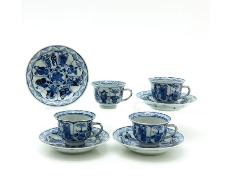 Blue and white decor with alternating Chinese scenes, marked with double ring and 4 characters, saucers are 12 cm. in diamete