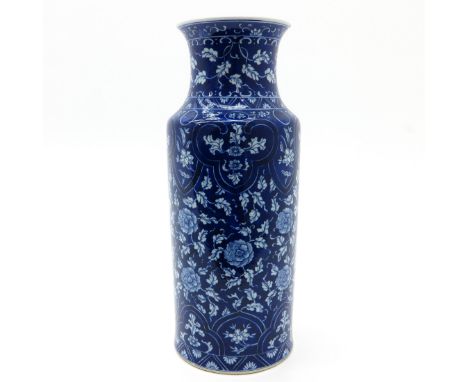Blue and white floral decor, marked with double ring, 47 cm. tall.