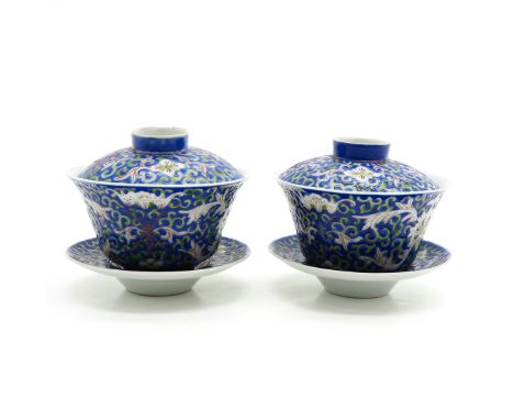 Blue ground, with 6 character Qianlong mark, saucers are 11 cm. in diameter.