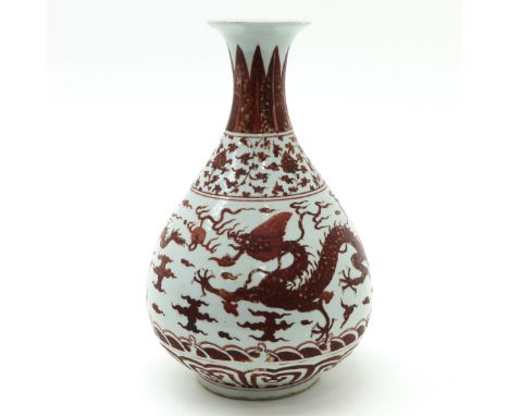 Iron red 5 clawed dragon decor, marked with double ring and 6 characters, 34 cm. tall.