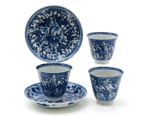 Including 3 cups and 2 saucers, blue and white floral decor, marked with double ring on bottom, saucers are 12 cm. in diamete