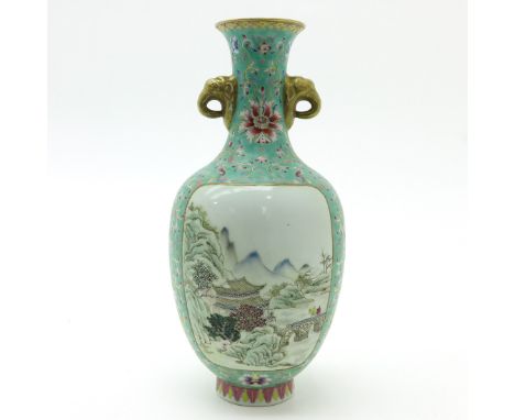 Light green background with Famille Rose enamels, landscape decor, marked on bottom with seal mark, 33 cm. tall.