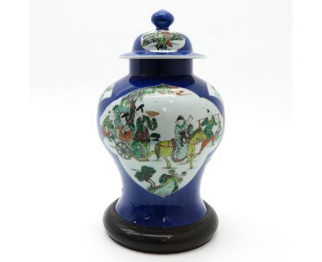19th Century, powder blue background with Famille Verte decor scenes of Chinese people and landscape decor, marked with doubl
