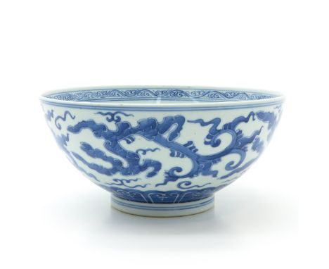 Blue and white decor, marked on bottom with double ring and symbol, 21 cm. in diameter.