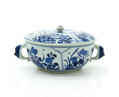 Blue and white floral decor, marked with double ring on the bottom, 19 cm. in diameter, hairline in handle.