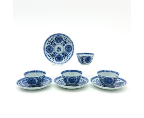 Blue and white floral decor, saucers are 12 cm. in diameter, some with chip and hairline.