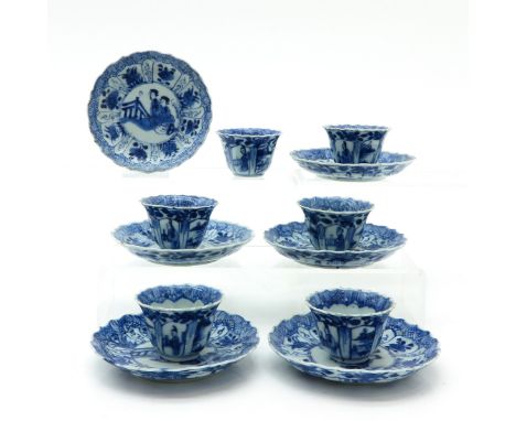18th Century, blue and white decor, saucers are 12 cm. in diameter, some with chip and hairline.