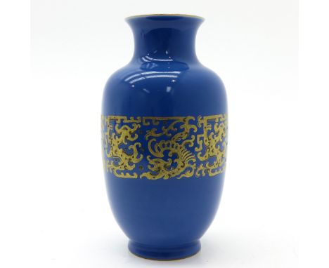 Light blue glaze with gold overlay decor, marked on bottom with seal mark, 22 cm. tall.