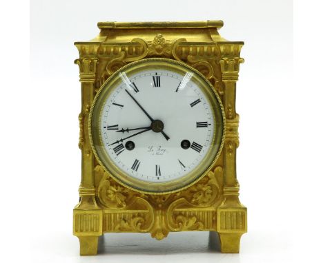 Gold gilt with Grand Sonnerie and alarm work with cord. You may find a similar clock in the book titled La Pendule Francaise 