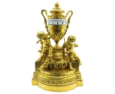 Louis XIV period, gold gilt sculptures depicting puttis on the right and left of movement with water fountain in center depic