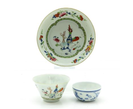 Including 2 cups and 1 saucers, saucer is 12 cm. in diameter, hairline.