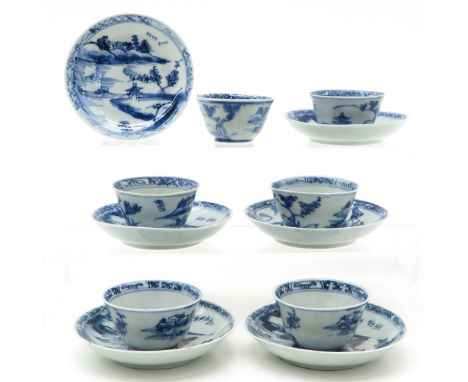 Blue and white landscape decor, saucers are 9 cm. in diameter, some with chip and hairline. 