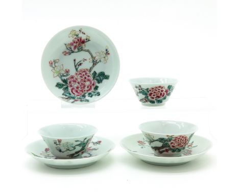 Famille Rose decor, saucers are 10 cm. in diameter, one cup with hairline.