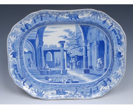 A Spode Caramanian Series oval meat plate, transfer printed in in tones of blue Antique Fragments at Limissoi, the border wit