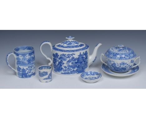 A Spode Willow pattern teapot and cover, transfer printed in tones of blue with fence, pagoda, pine trees and other foliage, 