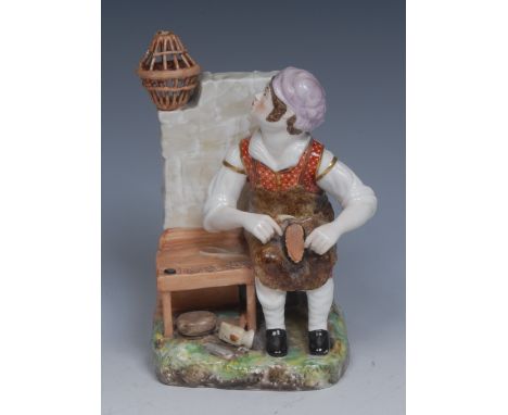A Derby Sampson Hancock figure, The Cobbler, seated working with tools of his trade, a caged bird behind him, 15.5cm high, S.
