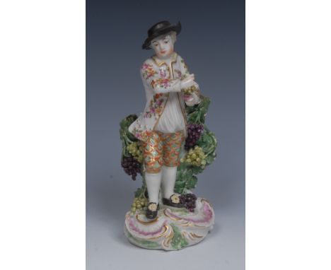 A Derby Patch Mark figure, The Chelsea Season,  Allegorical of Autumn, standing wearing a broad brimmed black hat, floral jac