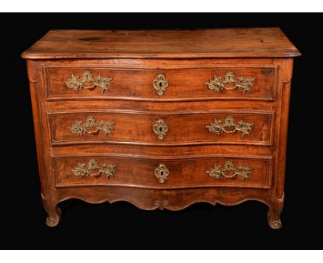 A French Provincial fruitwood serpentine commode, moulded top above three long drawers, gilt metal Rococo handles and escutch
