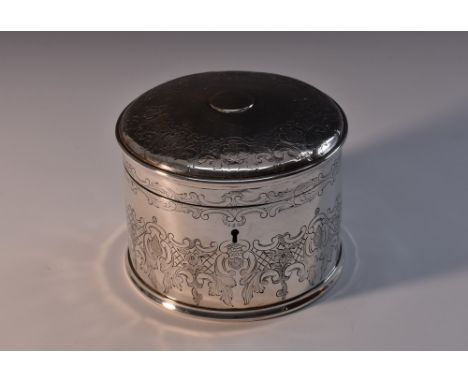 A Victorian silver cylindrical tea caddy, hinged cover, engraved in the 18th century taste with flowers, scrolls and diapers,