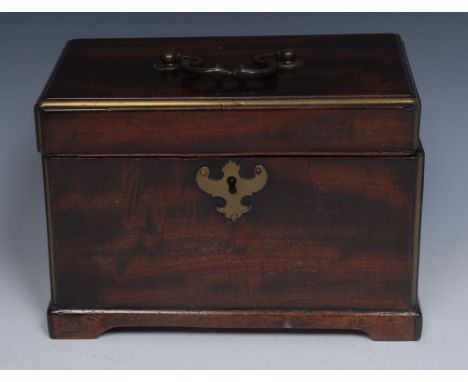 A George III rectangular tea caddy, brass strung angles, bat shaped escutcheon, swan neck handle, bracket feet, the interior 