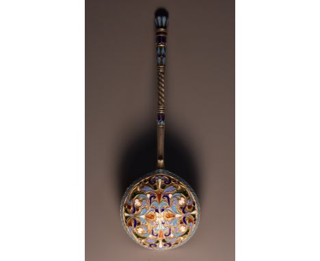 A Russian silver and cloisonne enamel spoon, brightly decorated in polychrome on a gilt textured ground, gilt bowl, 15.5cm lo