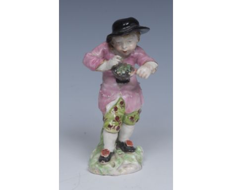 A Derby Patch Mark figure, The Grotesque Season, Winter, he stands wearing a broad brimmed black hat, pink jacket and fancy b