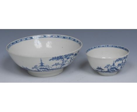A Worcester Cannon Ball pattern bowl, decorated with huts, foliage and round boulders, the interior with trellis, 17.5cm diam