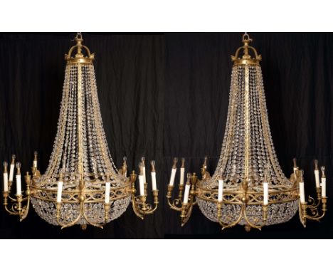 A pair of substantial 18th century style bag-shaped twelve-light chandeliers, profusely strung with graduated faceted glass d