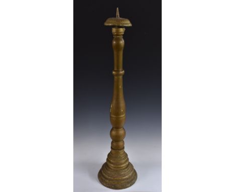 A 19th century giltwood floor standing pricket candlestick, domed sconce, turned column, stepped base, 110cm high 