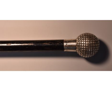 A late Victorian novelty silver and ebony walking stick, retailed by Brigg [of London], the pommel cast as a golf ball, monog