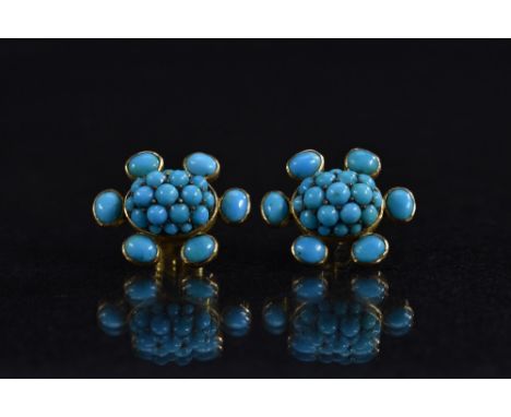 A pair of turquoise beaded cluster earrings, central oval beaded cluster within a six petal surround, unmarked yellow/rose me