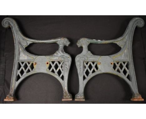 A pair of victorian cast iron scroll-back garden bench ends, by Henton & Chattell of Nottingham, cast with anthemions and lio