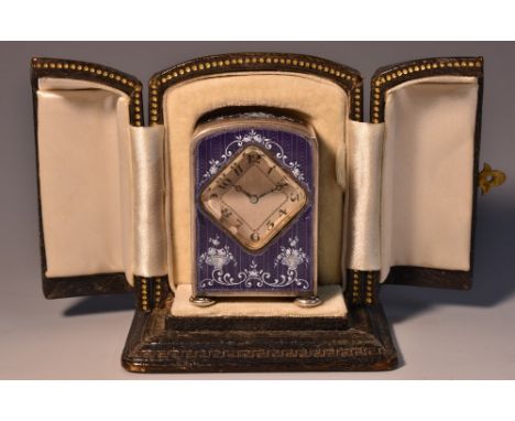 An early 20th century silver and enamel miniature carriage timepiece, 2.5cm silvered lozenge shaped silvered dial inscribed w