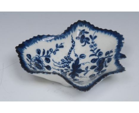 A Worcester leaf shaped pickle dish, painted in dark blue with the pickle leaf vine pattern, the underside in relief with vei