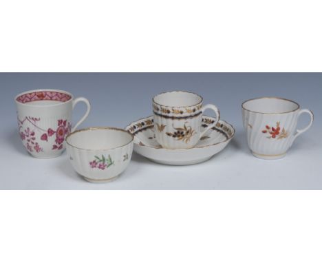 A Worcester fluted tea bowl, decorated in the famille rose palette with flower spray and sprigs, c.1765;  a similar reeded co