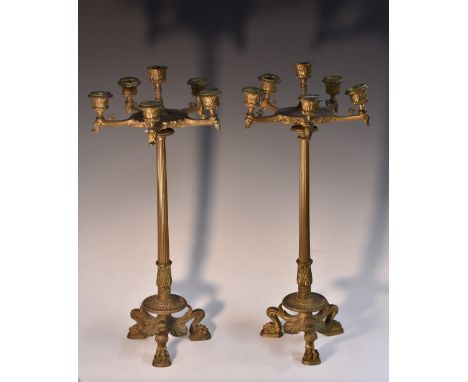 A pair of 19th century Grecian Revival 'Grand Tour' six light tall table candleabra, lotus cast sconces, acanthus fluted colu