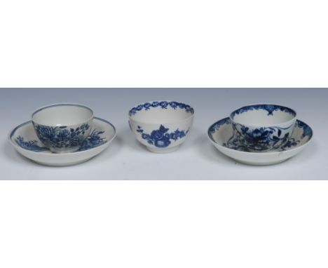A Worcester Fence pattern tea bowl and saucer, printed in underglaze blue with fence, birds in flight and foliage, tram line 