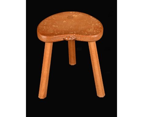 Robert Thompson of Kilburn - an oak Mouseman stool, shaped seat, octagonal spreading legs, 36cm high, carved mouse signature 