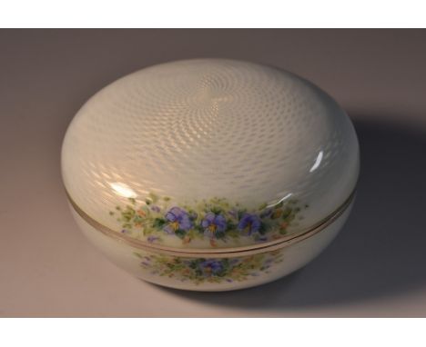 An early 20th century Continental silver and enamel bun shaped box and cover, decorated with violets on an opaque engine turn