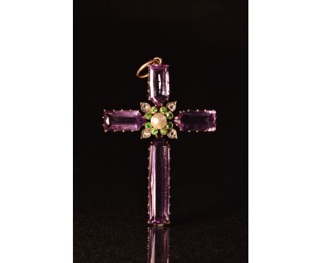 A sapphire, amethyst, peridot and mother of pearl cross pendant, central mother of pearl cabochon surrounded by a band of eig