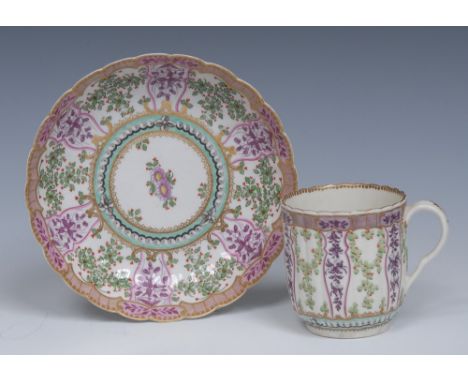 A Worcester Hop Trellis pattern reeded coffee cup, inspired by Sèvres, gilt and carmine trellis linked by festoons of pink an