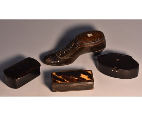 A 19th century novelty snuff box, carved as a shoe, sliding cover decorated with brass pinwork and inlaid with a mother of pe