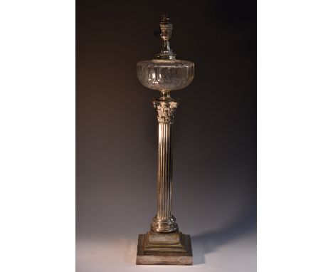 An early 20th century Corinthian column oil lamp, facetted globular reservoir, fluted column, stepped square base, A Hinks pa