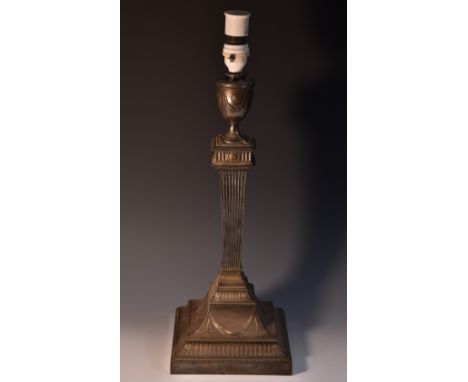 An early 20th century E.P.N.S. table lamp, the nozzle cast with swags and flowerheads, fluted column, spreading square base, 