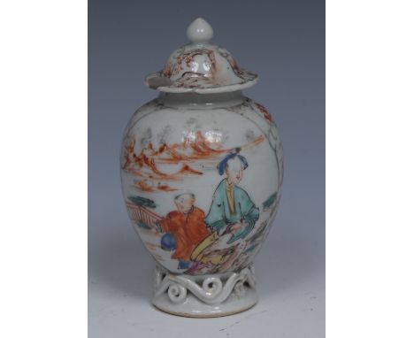 An 18th century Chinese Export porcelain ovoid tea caddy and cover, painted in polychrome with traditional figures in landsca