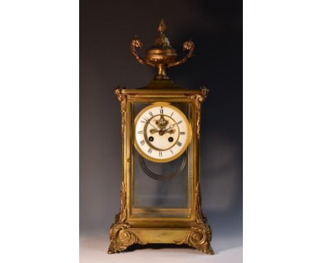 A late 19th century French gilt brass  mantel clock, 12cm round recessed enamel dial, Roman chapter,  visible Brocot escapeme