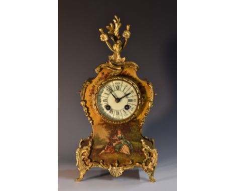 A 19th century French cartouche mantel clock,  8cm round rial with Roman and Arabic chapters, 14 day movement striking on a g